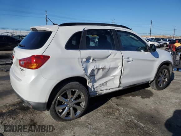 2013 Mitsubishi Outlander LE with VIN 4A4AP5AU0DE022676, listed as a Copart auction lot 86818835 with 221,484 mi miles and Salvage title. Bid and sale history available at DreamBid. Image 3.