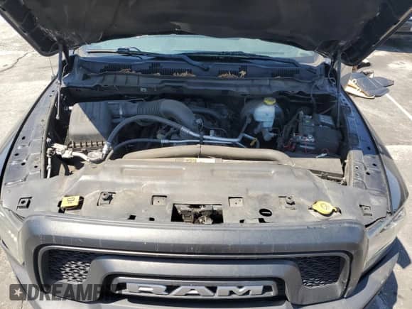 2021 Ram 1500 Warlock z VIN 1C6RR6GT7MS504076, wystawiony jako Copart lot #68470805 z przebiegiem 80 571 mil mil oraz Szkoda całkowita • Salvage title. Historia ofert i sprzedaży dostępna na DreamBid. Obrazek 11.