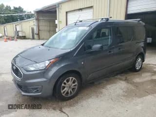 ✅ 2021 Ford Transit Connect XLT • VIN: NM0GS9F23M1491408 • Lot: 69557005. Listed on Copart with 156,960 mi. Free auction sales archive from the USA and detailed vehicle history report at DreamBid. Image 1.