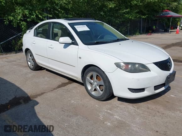 ✅ 2005 Mazda 3 i • VIN: JM1BK12F551281126 • Lot: 43010180. Listed on IAAI with 194,642 mi. Free auction sales archive from the USA and detailed vehicle history report at DreamBid. Image 1.