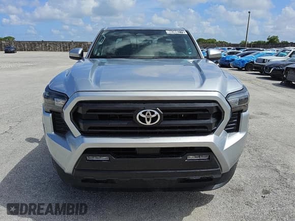 ✅ 2024 Toyota Tacoma SR5 • VIN: 3TMKB5FN8RM002169 • Lot: 60308275. Listed on Copart with 5,789 mi. Free auction sales archive from the USA and detailed vehicle history report at DreamBid. Image 5.