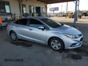 ✅ 2018 Chevrolet Cruze LS • VIN: 1G1BC5SM7J7134731 • Lot: 82364625. Listed on Copart with 84,754 mi. Free auction sales archive from the USA and detailed vehicle history report at DreamBid. Image 4.