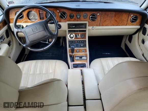 ✅ 1994 Bentley Brooklands • VIN: SCBZE02C5RCX54428 • Lot: 83754774. Wystawiony na Copart z przebiegiem 57 417 mil. Bezpłatny archiwum sprzedaży aukcyjnych z USA i szczegółowy raport historii pojazdu na DreamBid. Zdjęcie 8.