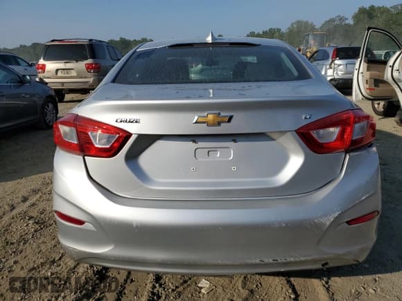 ✅ 2018 Chevrolet Cruze LT • VIN: 1G1BE5SM2J7163760 • Lot: 61924883. Listed on Copart with 62,963 mi. Free auction sales archive from the USA and detailed vehicle history report at DreamBid. Image 6.