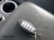 ✅ 2015 Nissan Pathfinder Platinum • VIN: 5N1AR2MM1FC685339 • Lot: 43901579. Listed on IAAI with 126,842 mi. Free auction sales archive from the USA and detailed vehicle history report at DreamBid. Image 11.