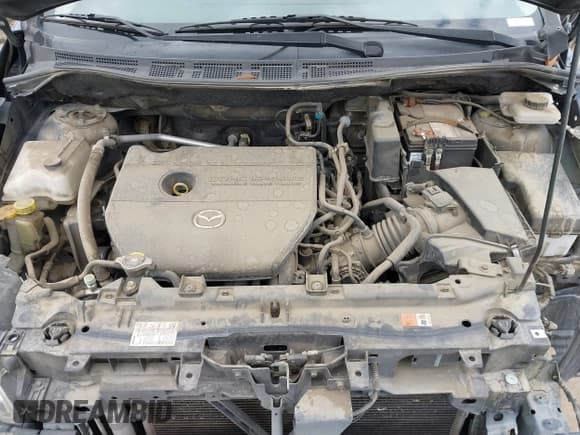 ✅ 2014 Mazda 5 Sport • VIN: JM1CW2BL1E0176111 • Lot: 42060863. Listed on IAAI with 121,814 mi. Free auction sales archive from the USA and detailed vehicle history report at DreamBid. Image 10.