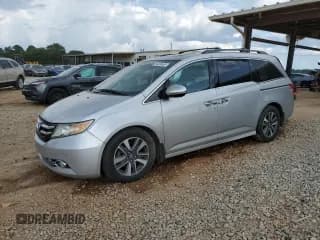 ✅ 2014 Honda Odyssey Touring • VIN: 5FNRL5H93EB104411 • Lot: 64494665. Wystawiony na Copart z przebiegiem 215 582 mil. Bezpłatny archiwum sprzedaży aukcyjnych z USA i szczegółowy raport historii pojazdu na DreamBid. Zdjęcie 1.