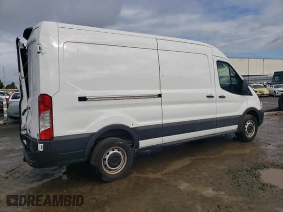 ✅ 2021 Ford Transit Cargo • VIN: 1FTBR1CG7MKA88875 • Lot: 84705324. Listed on Copart with 23,654 mi. Free auction sales archive from the USA and detailed vehicle history report at DreamBid. Image 3.