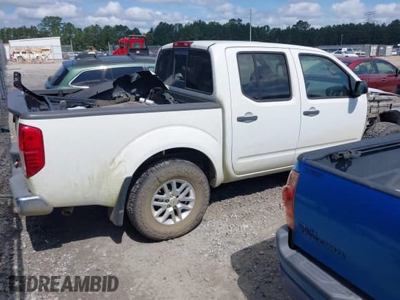✅ 2018 Nissan Frontier SV • VIN: 1N6AD0EV1JN717375 • Lot: 42491578. Listed on IAAI with 88,000 mi. Free auction sales archive from the USA and detailed vehicle history report at DreamBid. Image 4.