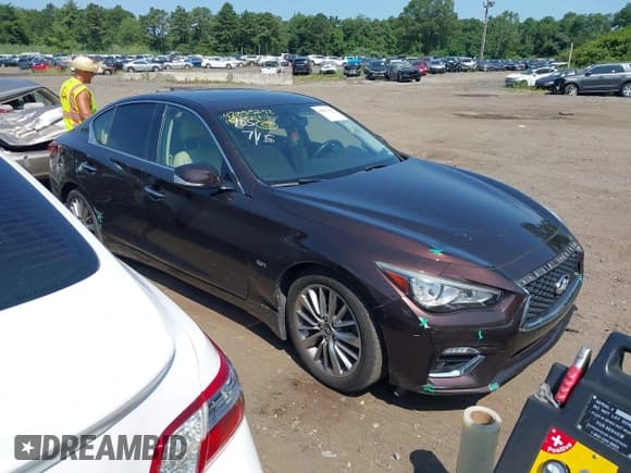 ✅ 2018 Infiniti Q50 Luxe • VIN: JN1EV7AR9JM610733 • Lot: 42855292. Listed on IAAI with 68,218 mi. Free auction sales archive from the USA and detailed vehicle history report at DreamBid. Image 1.