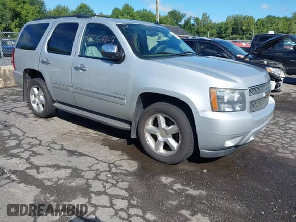 2011 Chevrolet Tahoe LTZ with VIN 1GNSKCE01BR231833, listed as a IAAI auction lot 43053303 with 247,341 mi miles and . Bid and sale history available at DreamBid. Image 1.