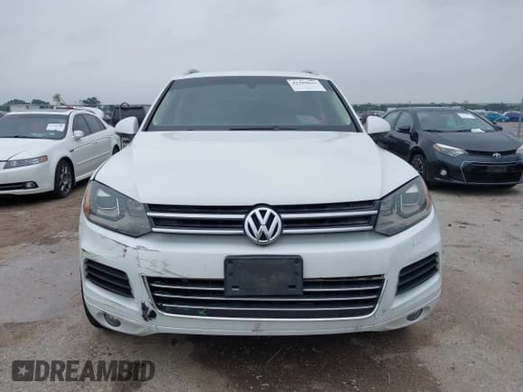 ✅ 2012 Volkswagen Touareg Lux • VIN: WVGEK9BPXCD006816 • Lot: 42289916. Listed on IAAI with 116,658 mi. Free auction sales archive from the USA and detailed vehicle history report at DreamBid. Image 12.