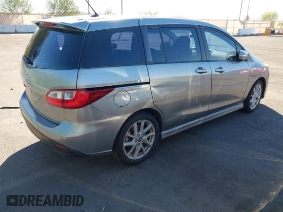✅ 2013 Mazda 5 Touring • VIN: JM1CW2CL2D0160965 • Lot: 43410114. Listed on IAAI with 107,043 mi. Free auction sales archive from the USA and detailed vehicle history report at DreamBid. Image 4.