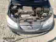 2009 Hyundai Elantra GLS z VIN KMHDU46D89U714290, wystawiony jako Copart lot #70099934 z przebiegiem 109 162 mil mil oraz Szkoda całkowita • Salvage title. Historia ofert i sprzedaży dostępna na DreamBid. Obrazek 11.