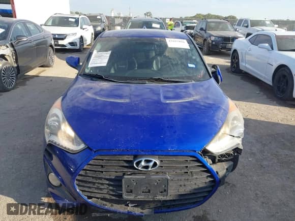 2014 Hyundai Veloster Turbo z VIN KMHTC6AE4EU184467, wystawiony jako IAAI lot #43457856 z przebiegiem 149 546 mil mil oraz . Historia ofert i sprzedaży dostępna na DreamBid. Obrazek 13.