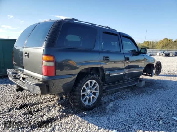 2003 Chevrolet Tahoe LT с VIN 1GNEC13Z73R251327, выставлен на аукционе Copart как лот 85694465 с пробегом 132 064 миль миль и Списание • Salvage title. История ставок и продаж доступна на DreamBid. Изображение 3.