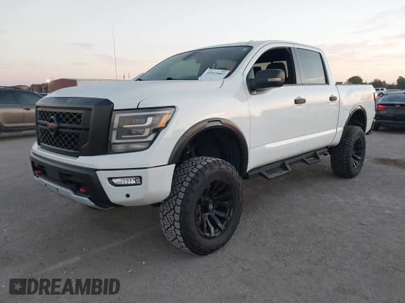 ✅ 2020 Nissan Titan SL • VIN: 1N6AA1ED1LN510557 • Lot: 43413407. Listed on IAAI with 48,074 mi. Free auction sales archive from the USA and detailed vehicle history report at DreamBid. Image 18.