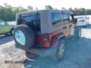 ✅ 2007 Jeep Wrangler Unlimited Sahara • VIN: 1J8GA59187L211825 • Lot: 42313099. Listed on IAAI with 107,554 mi. Free auction sales archive from the USA and detailed vehicle history report at DreamBid. Image 4.