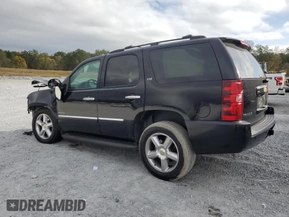✅ 2012 Chevrolet Tahoe LTZ • VIN: 1GNSCCE08CR279697 • Lot: 79423014. Listed on Copart with 217,990 mi. Free auction sales archive from the USA and detailed vehicle history report at DreamBid. Image 2.