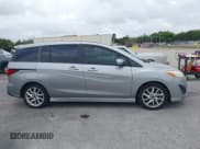 ✅ 2013 Mazda 5 Touring • VIN: JM1CW2CL5D0160104 • Lot: 41722470. Listed on IAAI with 135,708 mi. Free auction sales archive from the USA and detailed vehicle history report at DreamBid. Image 13.