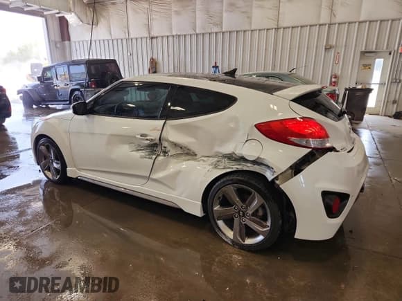 ✅ 2014 Hyundai Veloster Turbo • VIN: KMHTC6AE9EU196159 • Lot: 71451785. Wystawiony na Copart z przebiegiem 77 852 mil. Bezpłatny archiwum sprzedaży aukcyjnych z USA i szczegółowy raport historii pojazdu na DreamBid. Zdjęcie 2.