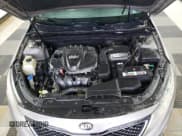 ✅ 2014 Kia Optima LX • VIN: 5XXGM4A70EG295029 • Lot: 90610895. Listed on Copart with 146,971 mi. Free auction sales archive from the USA and detailed vehicle history report at DreamBid. Image 11.