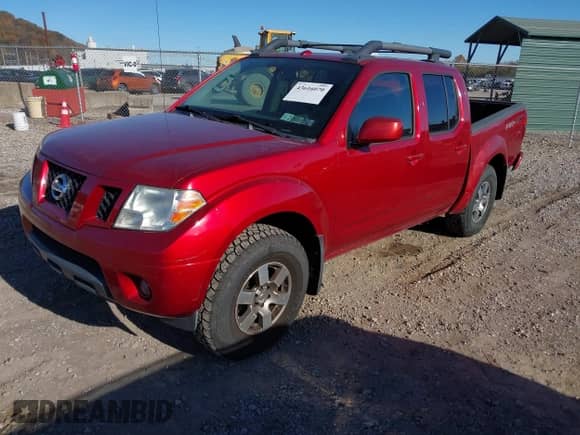 2012 Nissan Frontier SL z VIN 1N6AD0EV3CC445474, wystawiony jako IAAI lot #43616070 z przebiegiem 226 537 mil mil oraz . Historia ofert i sprzedaży dostępna na DreamBid. Obrazek 2.