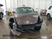 ✅ 2012 Volkswagen Beetle 2.5L PZEV • VIN: 3VWJP7AT9CM628607 • Lot: 66799855. Listed on Copart with 79,825 mi. Free auction sales archive from the USA and detailed vehicle history report at DreamBid. Image 5.