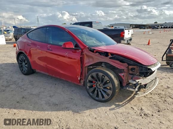 ✅ 2022 Tesla Model Y Performance • VIN: 7SAYGDEFXNF520639 • Lot: 94026965. Wystawiony na Copart z przebiegiem 73 671 mil. Bezpłatny archiwum sprzedaży aukcyjnych z USA i szczegółowy raport historii pojazdu na DreamBid. Zdjęcie 4.