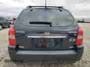 2009 Hyundai Tucson SE z VIN KM8JN72D49U975875, wystawiony jako Copart lot #76923954 z przebiegiem 167 155 mil mil oraz Szkoda całkowita • Salvage title. Historia ofert i sprzedaży dostępna na DreamBid. Obrazek 6.