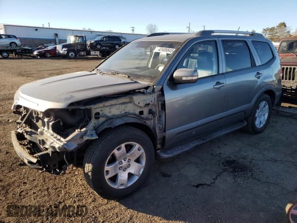 ✅ 2009 Kia Borrego LX • VIN: KNDJH741795017158 • Лот: 42489845. Опубликован ранее на Copart с пробегом 116 336 миль. Бесплатный доступ к архиву аукционных продаж из США и подробный отчёт об истории автомобиля на DreamBid. Изображение 1.