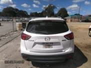 ✅ 2016 Mazda CX-5 Grand Touring • VIN: JM3KE2DY0G0695894 • Lot: 43441374. Wystawiony na IAAI z przebiegiem 112 838 mil. Bezpłatny archiwum sprzedaży aukcyjnych z USA i szczegółowy raport historii pojazdu na DreamBid. Zdjęcie 15.