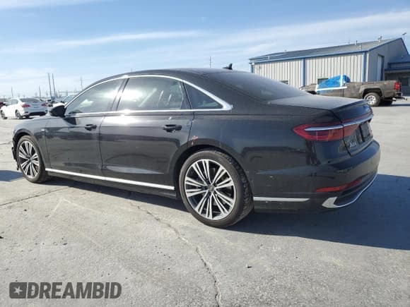 ✅ 2023 Audi A8 • VIN: WAULDAF8XPN011716 • Lot: 48926395. Listed on Copart with 14,436 mi. Free auction sales archive from the USA and detailed vehicle history report at DreamBid. Image 2.