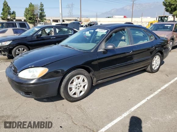 ✅ 2007 Ford Taurus SE • VIN: 1FAFP53U07A168037 • Lot: 87489435. Listed on Copart with 135,774 mi. Free auction sales archive from the USA and detailed vehicle history report at DreamBid. Image 1.