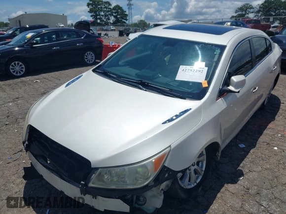 ✅ 2013 Buick LaCrosse Leather • VIN: 1G4GC5ER8DF320966 • Лот: 42752292. Опубликован ранее на IAAI с пробегом 99 261 миль. Бесплатный доступ к архиву аукционных продаж из США и подробный отчёт об истории автомобиля на DreamBid. Изображение 6.