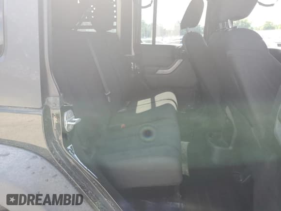 ✅ 2015 Jeep Wrangler Unlimited Freedom • VIN: 1C4BJWDG1FL745377 • Лот: 62645755. Опубликован ранее на Copart с пробегом 128 740 миль. Бесплатный доступ к архиву аукционных продаж из США и подробный отчёт об истории автомобиля на DreamBid. Изображение 10.