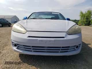 2007 Hyundai Tiburon GT с VIN KMHHN66F17U239526, выставлен на аукционе Copart как лот 64397625 с пробегом 136 807 миль миль и Списание • Salvage title. История ставок и продаж доступна на DreamBid. Изображение 5.