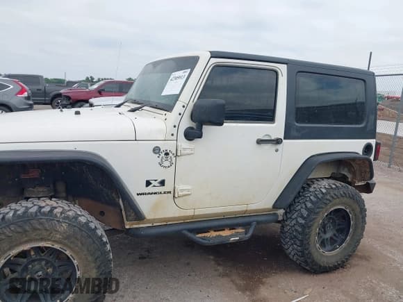 ✅ 2008 Jeep Wrangler X • VIN: 1J4FZ24108L653849 • Lot: 42305913. Listed on IAAI with 220,937 mi. Free auction sales archive from the USA and detailed vehicle history report at DreamBid. Image 13.