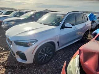 ✅ 2021 BMW X5 xDrive45e • VIN: 5UXTA6C08M9F29840 • Лот: 80960175. Опубликован ранее на Copart с пробегом Не указан. Бесплатный доступ к архиву аукционных продаж из США и подробный отчёт об истории автомобиля на DreamBid. Изображение 1.