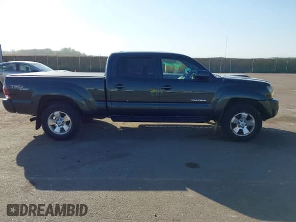 ✅ 2009 Toyota Tacoma • VIN: 5TEMU52N49Z622061 • Lot: 43381986. Listed on IAAI with 169,157 mi. Free auction sales archive from the USA and detailed vehicle history report at DreamBid. Image 13.