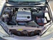 ✅ 2003 Toyota Camry LE • VIN: 4T1BF32K43U055096 • Lot: 91046665. Wystawiony na Copart z przebiegiem 57 911 mil. Bezpłatny archiwum sprzedaży aukcyjnych z USA i szczegółowy raport historii pojazdu na DreamBid. Zdjęcie 11.