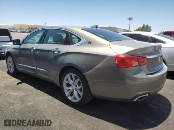 2019 Chevrolet Impala Premier z VIN 1G1105S35KU126237, wystawiony jako Copart lot #61374535 z przebiegiem 103 873 mil mil oraz Szkoda całkowita • Salvage title. Historia ofert i sprzedaży dostępna na DreamBid. Obrazek 2.