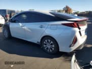 ✅ 2021 Toyota Prius Limited • VIN: JTDKAMFP6M3185340 • Lot: 90508375. Listed on Copart with 132,200 mi. Free auction sales archive from the USA and detailed vehicle history report at DreamBid. Image 2.