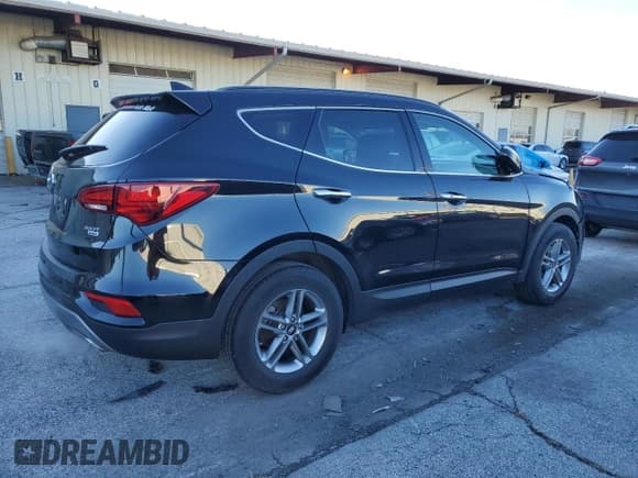 ✅ 2018 Hyundai Santa Fe 2.4L • VIN: 5NMZUDLB0JH061981 • Лот: 79767683. Опубликован ранее на Copart с пробегом 26 987 миль. Бесплатный доступ к архиву аукционных продаж из США и подробный отчёт об истории автомобиля на DreamBid. Изображение 3.