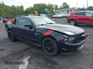✅ 2012 Ford Mustang Premium • VIN: 1ZVBP8AM9C5288013 • Lot: 42619141. Listed on IAAI with 77,596 mi. Free auction sales archive from the USA and detailed vehicle history report at DreamBid. Image 1.