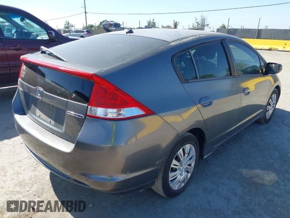 ✅ 2010 Honda Insight LX • VIN: JHMZE2H5XAS033628 • Lot: 42326613. Listed on IAAI with 239,068 mi. Free auction sales archive from the USA and detailed vehicle history report at DreamBid. Image 4.