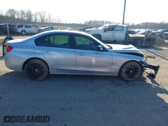 ✅ 2016 BMW 3 Series 320i xDrive • VIN: WBA8E5G52GNT93013 • Lot: 43754573. Listed on IAAI with 104,567 mi. Free auction sales archive from the USA and detailed vehicle history report at DreamBid. Image 13.