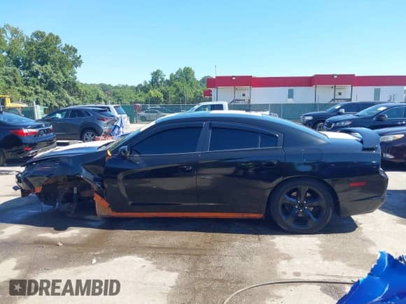 ✅ 2014 Dodge Charger RT • VIN: 2C3CDXCT3EH283596 • Lot: 43059244. Wystawiony na IAAI z przebiegiem 102 322 mil. Bezpłatny archiwum sprzedaży aukcyjnych z USA i szczegółowy raport historii pojazdu na DreamBid. Zdjęcie 15.