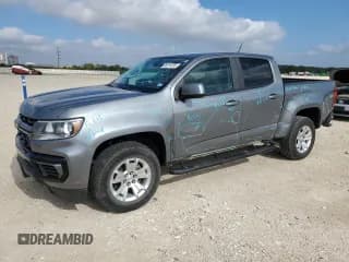 ✅ 2021 Chevrolet Colorado 2WD LT • VIN: 1GCGSCEA5M1273334 • Лот: 90315135. Опубликован ранее на Copart с пробегом 86 425 миль. Бесплатный доступ к архиву аукционных продаж из США и подробный отчёт об истории автомобиля на DreamBid. Изображение 1.