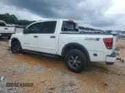 ✅ 2014 Nissan Titan Pro-4X • VIN: 1N6BA0EC0EN505410 • Lot: 65326545. Listed on Copart with 85,156 mi. Free auction sales archive from the USA and detailed vehicle history report at DreamBid. Image 2.